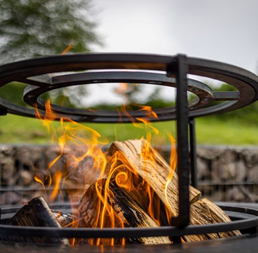 metal-fire-pit-with-the-wood-burning-in-the-hot-fl-2025-02-09-16-08-36-utc (1)