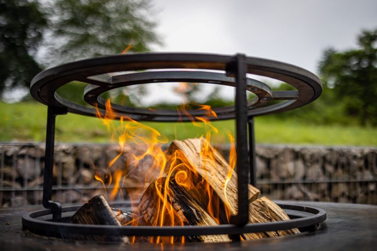 metal-fire-pit-with-the-wood-burning-in-the-hot-fl-2025-02-09-16-08-36-utc (1)